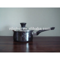 enamel pot with single bakelite handle